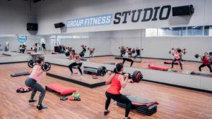 Three women are working out at the EoS Fitness