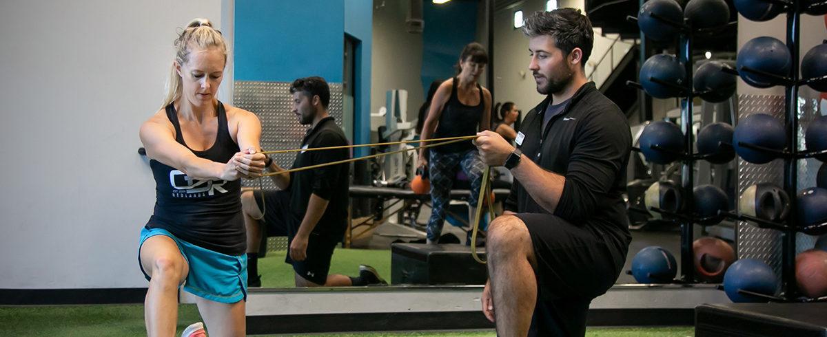 Woman working with Personal Trainer