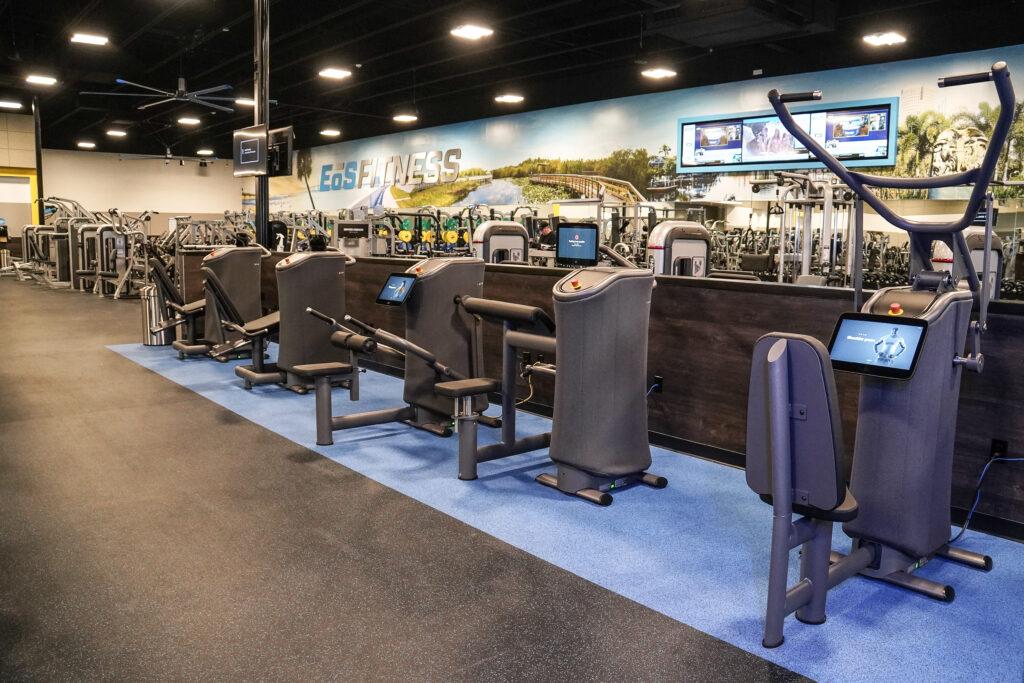 EGYM Smart Strength equipment lined up on a gym floor.