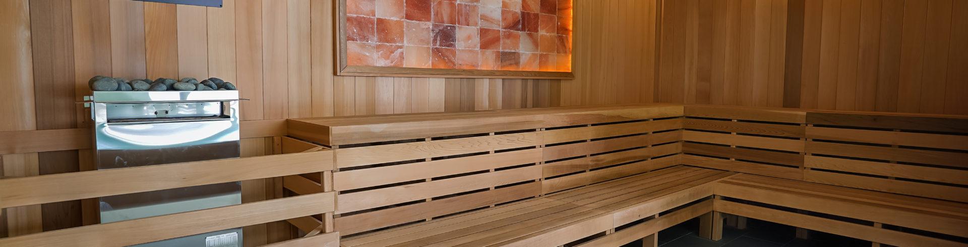 clean sauna with wooden paneling