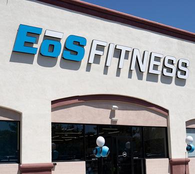 outside shot of sunny and modern fitness gym
