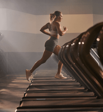 eos fitness member running on the treadmill