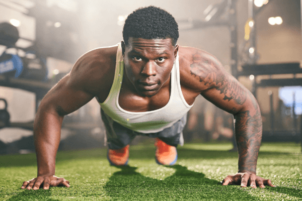 eos fitness member performing chest exercises
