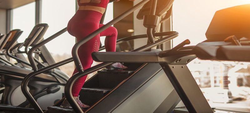 women doing a stair climber workout on the stair master